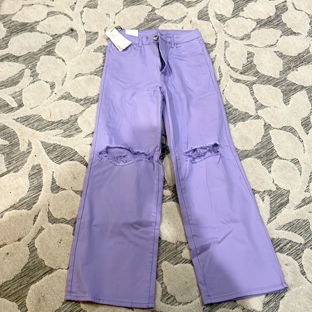Brand new Purple stretch jean with distressed knees